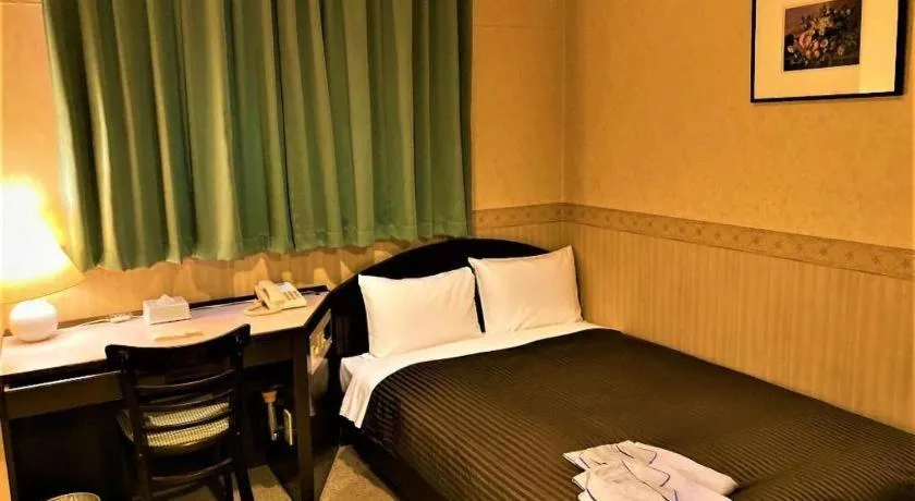 Bed in The Hamilton Sapporo Hotel