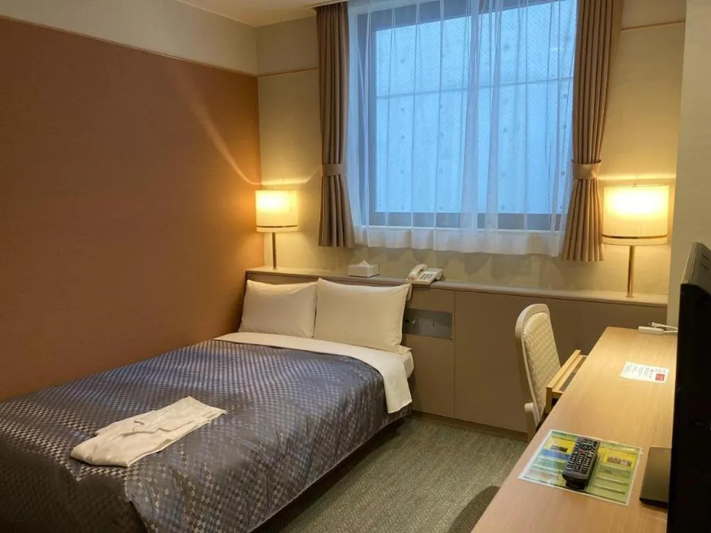 Bed in The Hamilton Sapporo Hotel