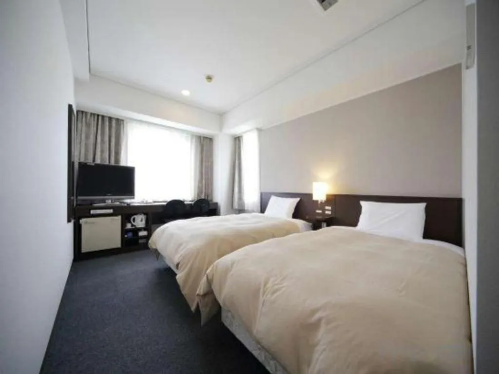 Bed in Hotel Park Side Hiroshima Peace Park