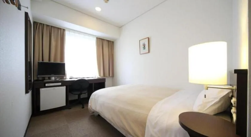 Bed in Hotel Park Side Hiroshima Peace Park