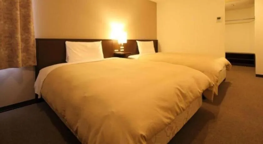 Bed in Hotel Park Side Hiroshima Peace Park