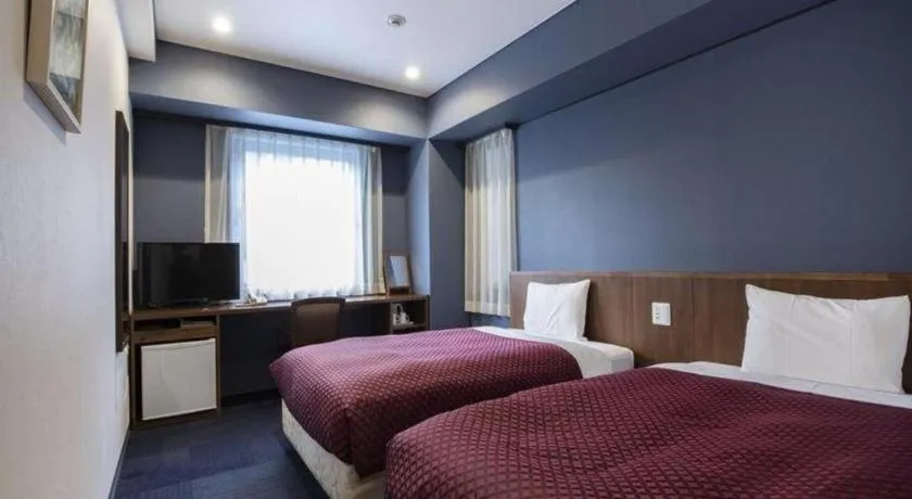 Bed in Hotel Park Side Hiroshima Peace Park