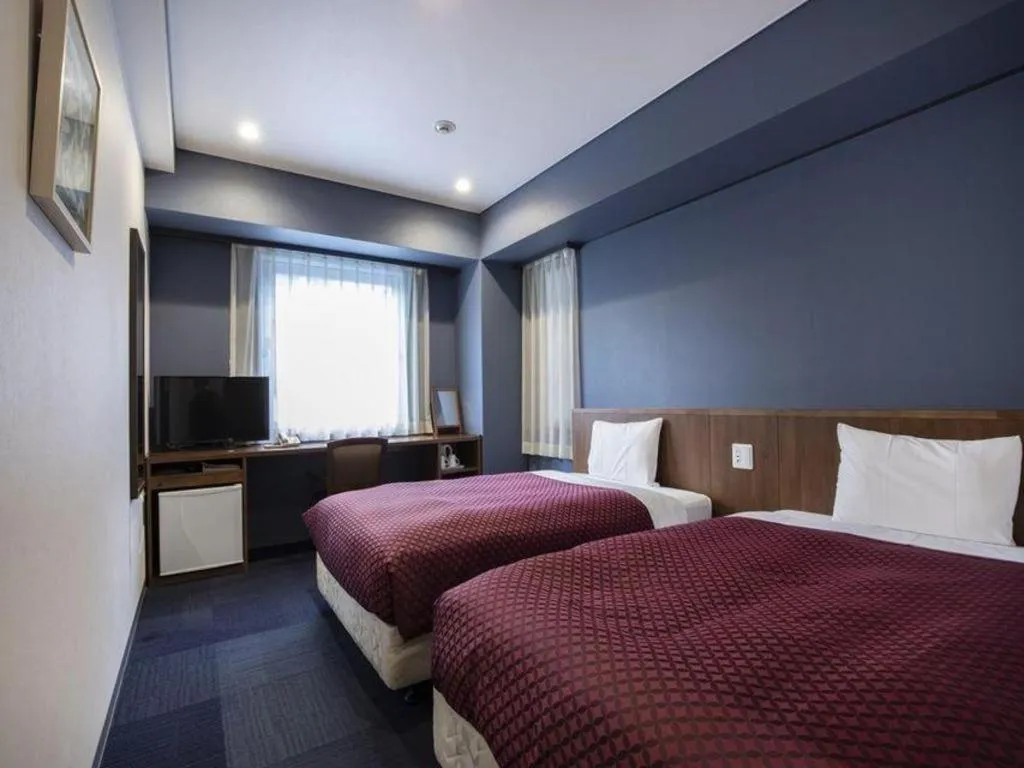 Bed in Hotel Park Side Hiroshima Peace Park