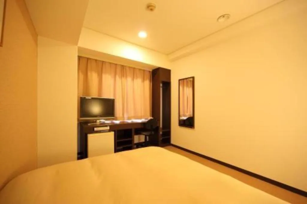 Bed in Hotel Park Side Hiroshima Peace Park