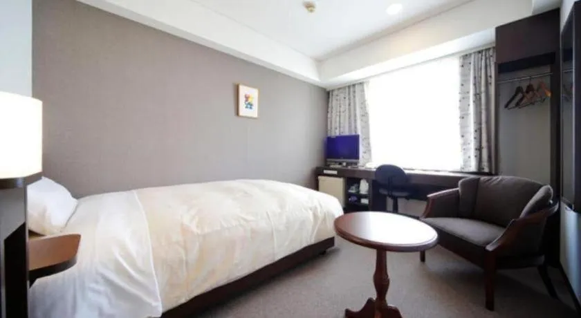 Bed in Hotel Park Side Hiroshima Peace Park