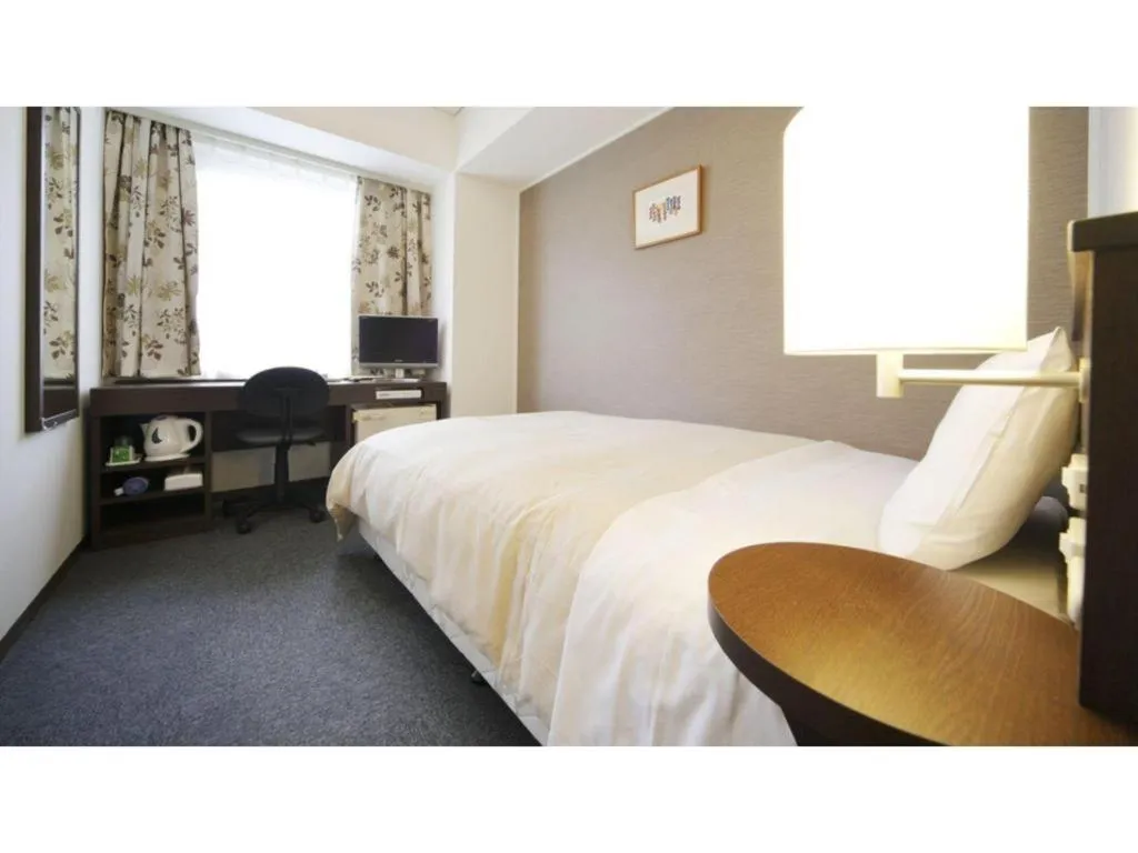 Bed in Hotel Park Side Hiroshima Peace Park