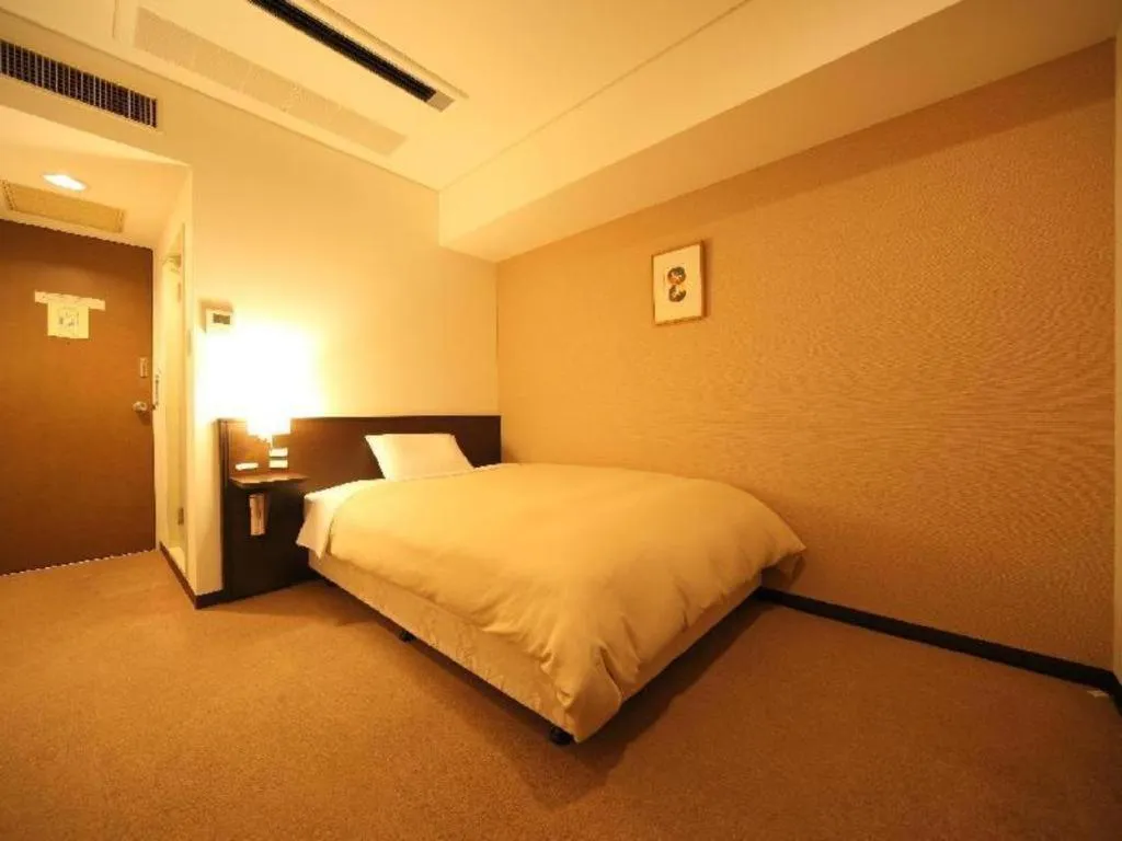 Bed in Hotel Park Side Hiroshima Peace Park