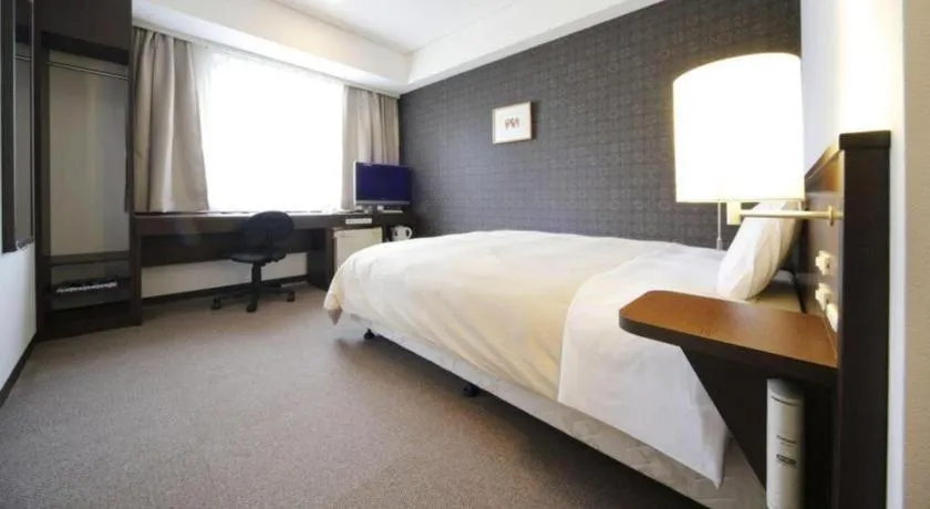 Bed in Hotel Park Side Hiroshima Peace Park