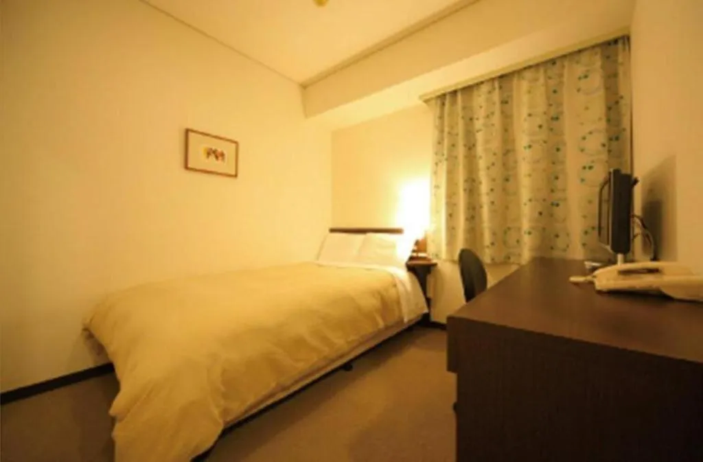 Bed in Hotel Park Side Hiroshima Peace Park