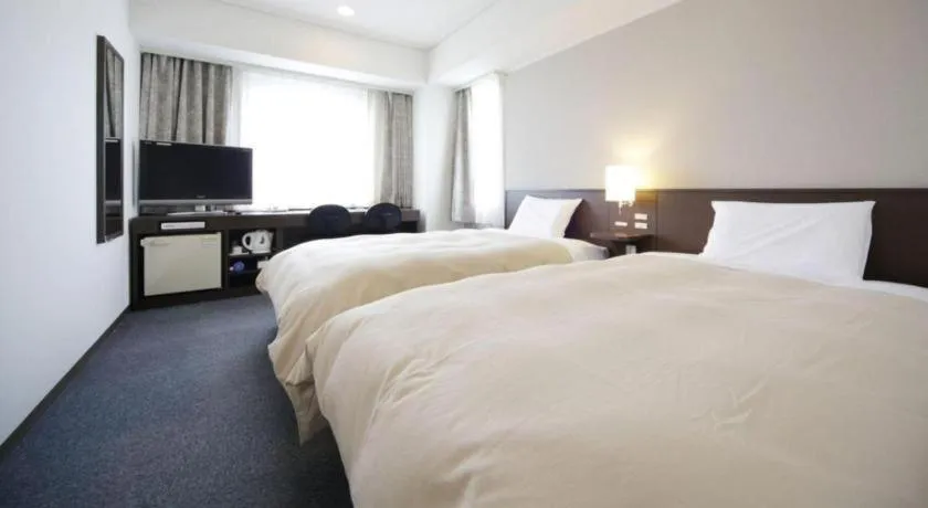 Bed in Hotel Park Side Hiroshima Peace Park