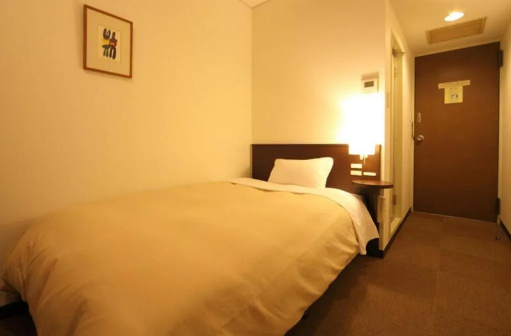 Bed in Hotel Park Side Hiroshima Peace Park