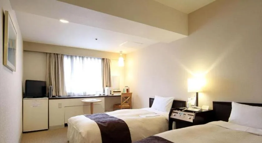 Bed in Hiroshima Kokusai Hotel