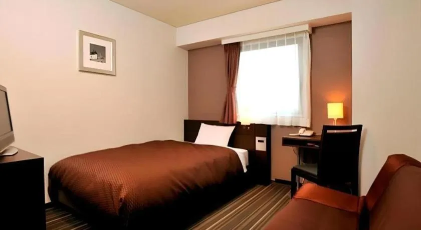 Bed in Daini Fuji Hotel