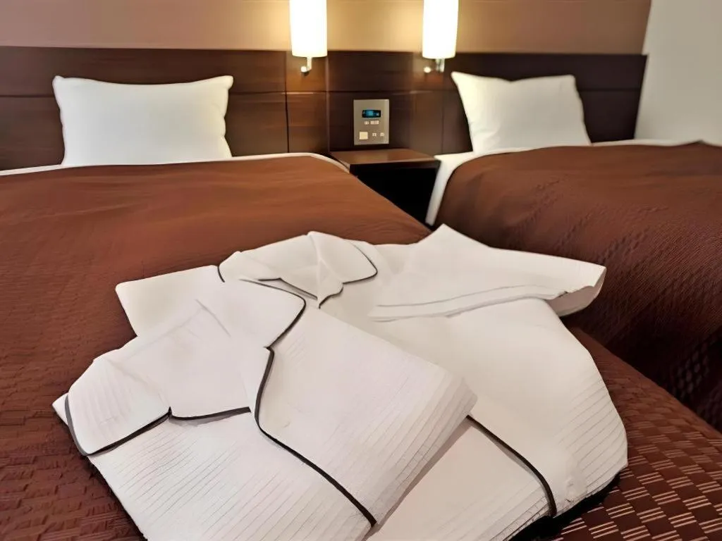 Bed in Daini Fuji Hotel