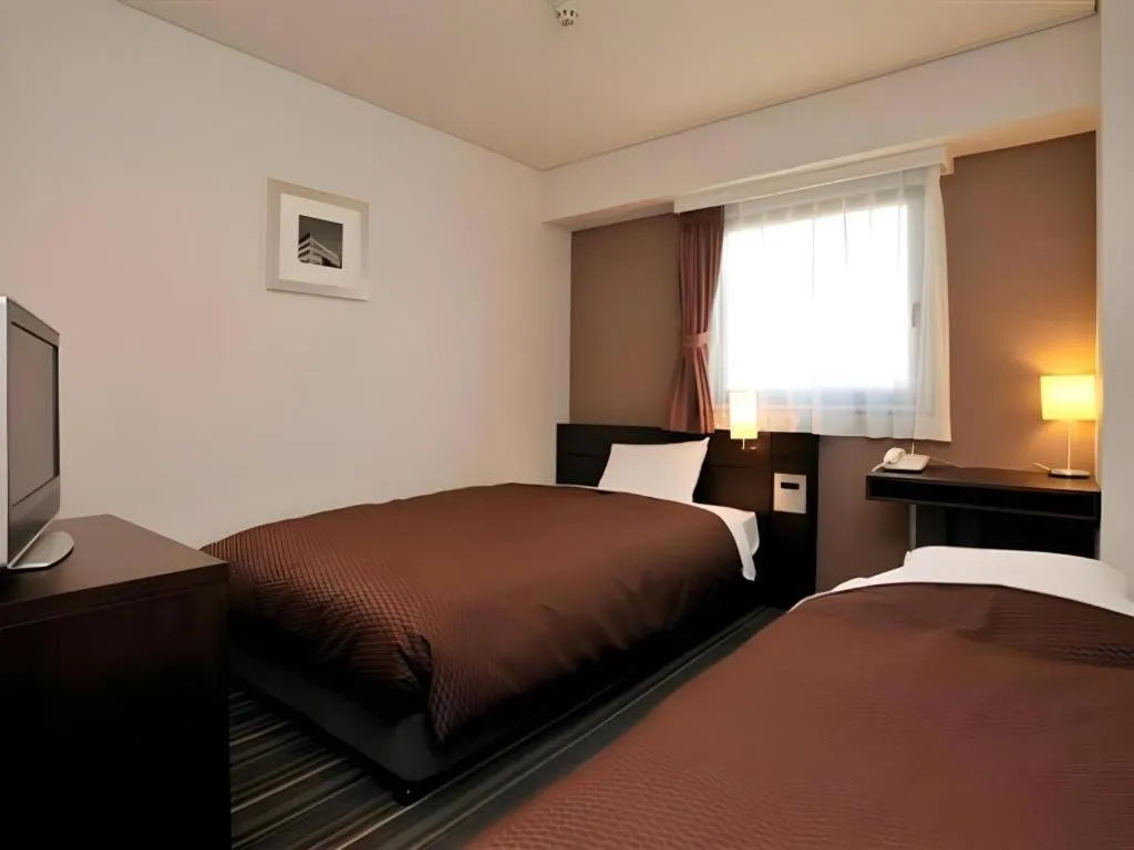 Bed in Daini Fuji Hotel