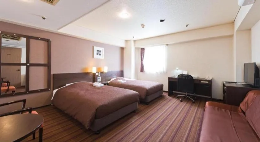 Bed in Daini Fuji Hotel