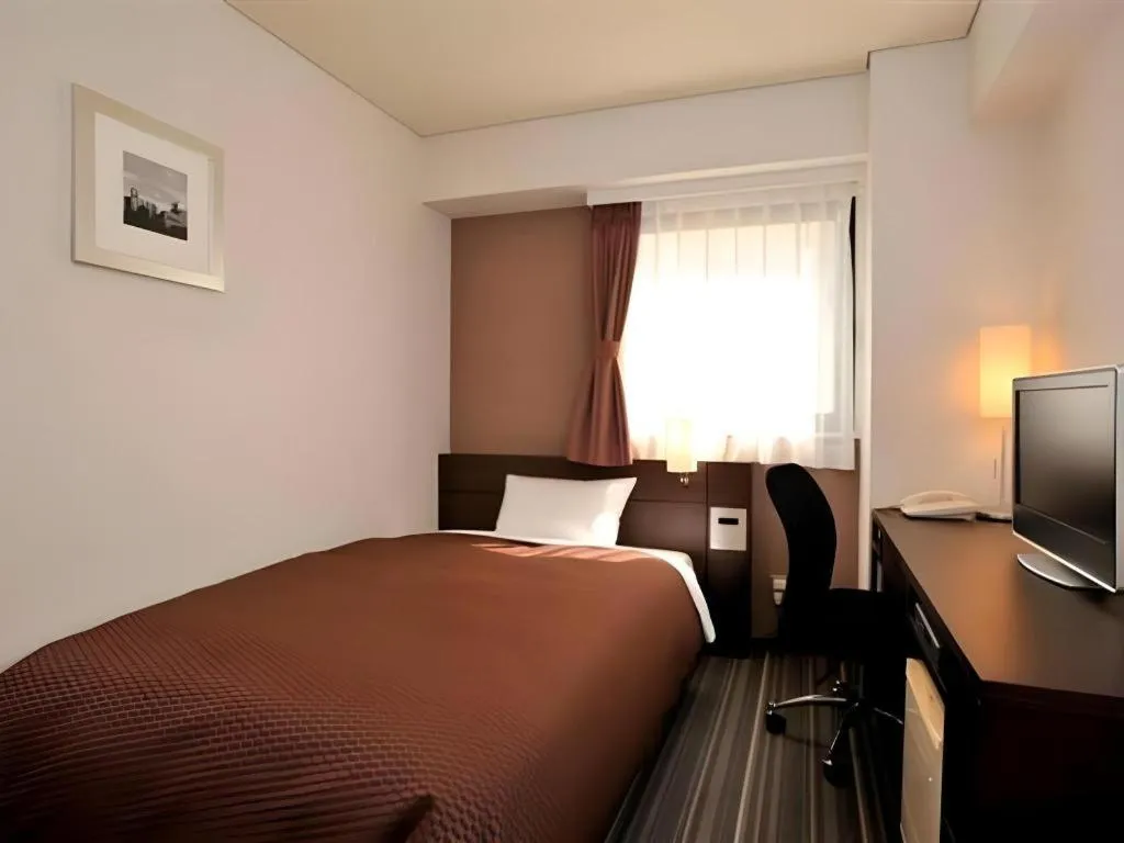 Bed in Daini Fuji Hotel