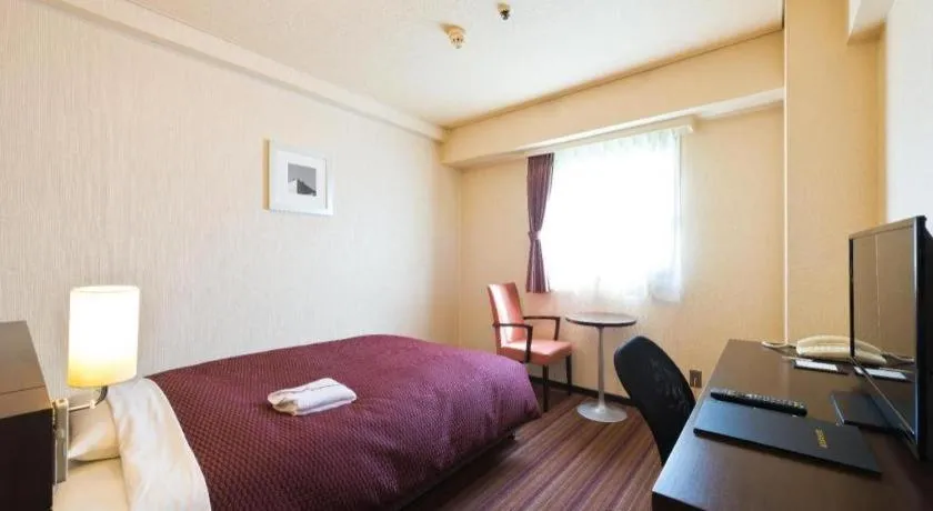 Bed in Daini Fuji Hotel