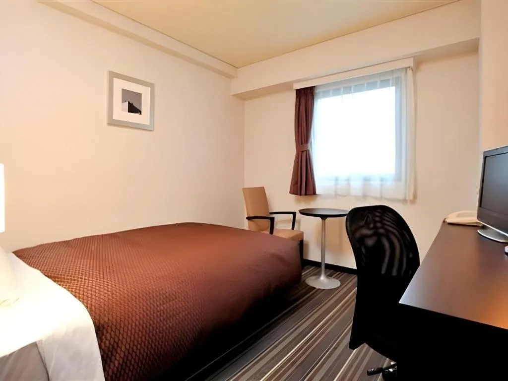 Bed in Daini Fuji Hotel