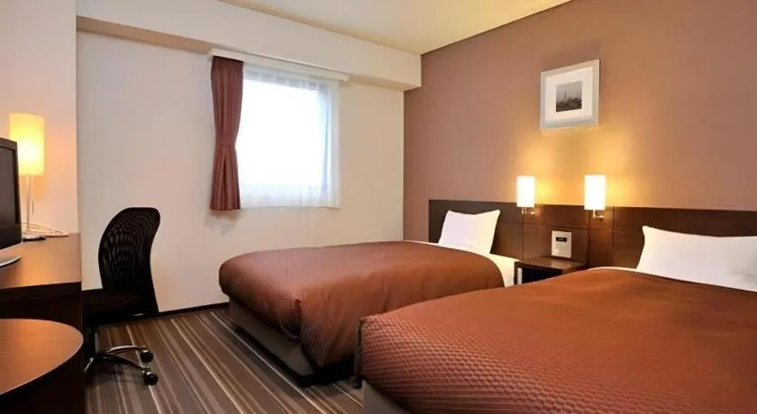 Bed in Daini Fuji Hotel