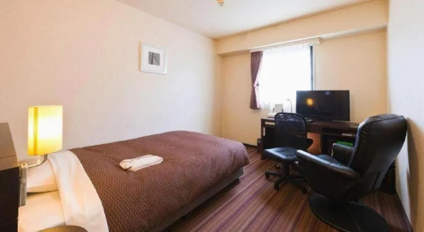 Bed in Daini Fuji Hotel