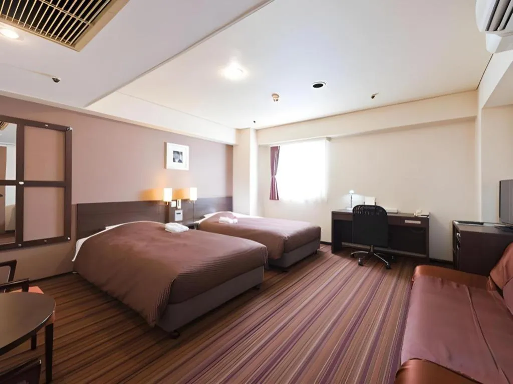 Bed in Daini Fuji Hotel