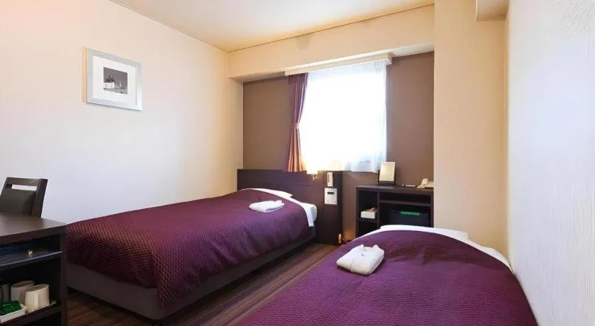 Bed in Daini Fuji Hotel