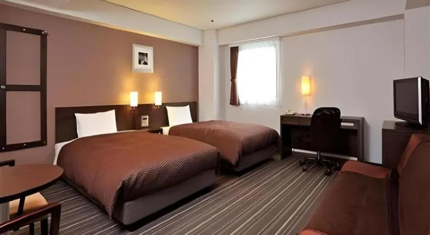 Bed in Daini Fuji Hotel