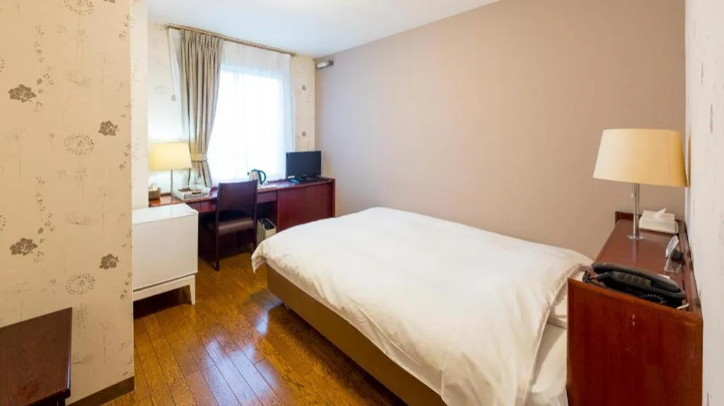 Bed in Fukuyama Terminal Hotel