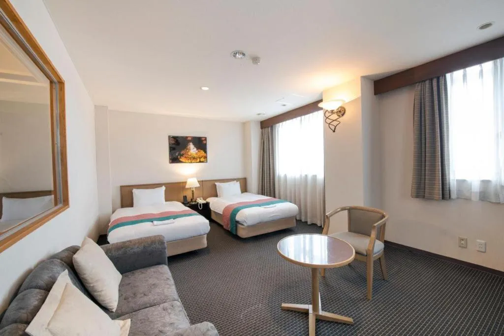 Bed in Hotel New Palace Aizuwakamatsu