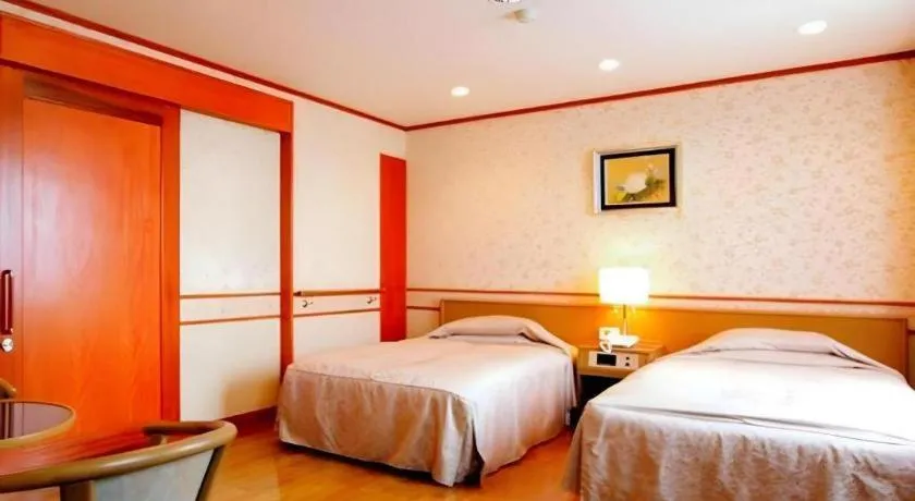 Bed in Hotel New Palace Aizuwakamatsu