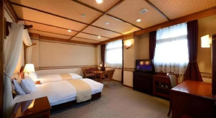 Bed in Hotel New Palace Aizuwakamatsu