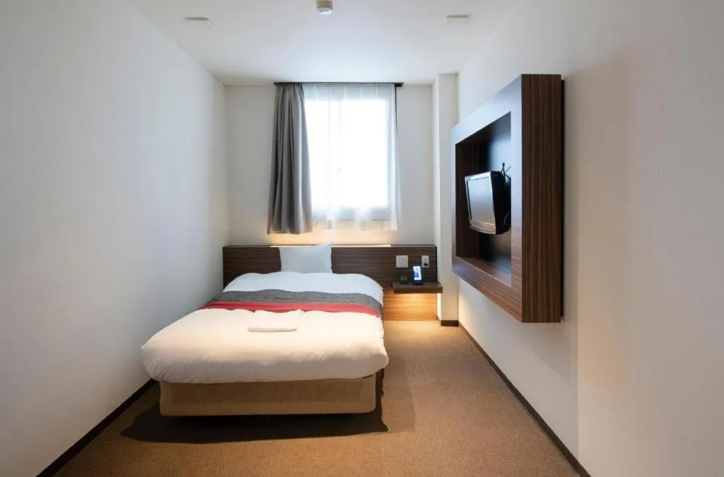 Bed in Hotel New Palace Aizuwakamatsu