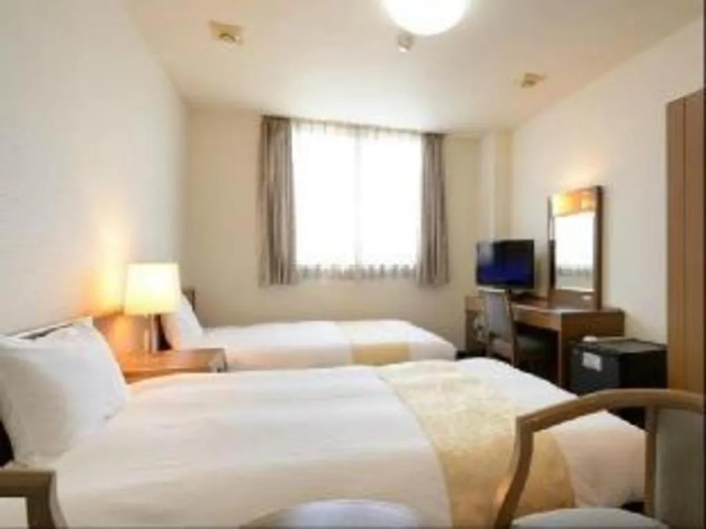 Bed in Hotel New Palace Aizuwakamatsu