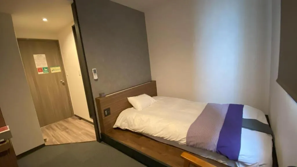 Bed in Hotel New Palace Aizuwakamatsu