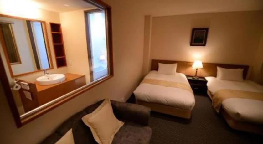 Bed in Hotel New Palace Aizuwakamatsu