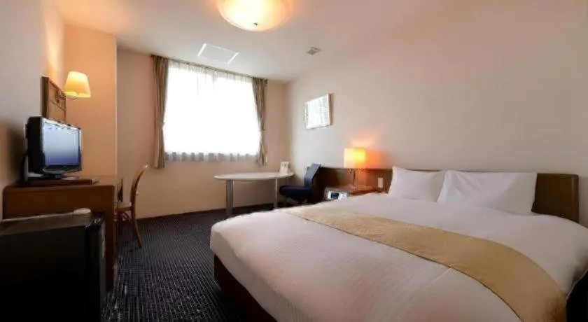 Bed in Hotel New Palace Aizuwakamatsu