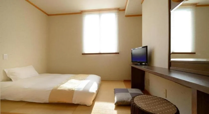 Bed in Hotel New Palace Aizuwakamatsu