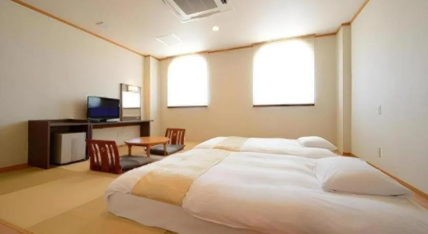 Bed in Hotel New Palace Aizuwakamatsu