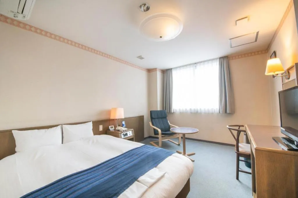 Bed in Hotel New Palace Aizuwakamatsu