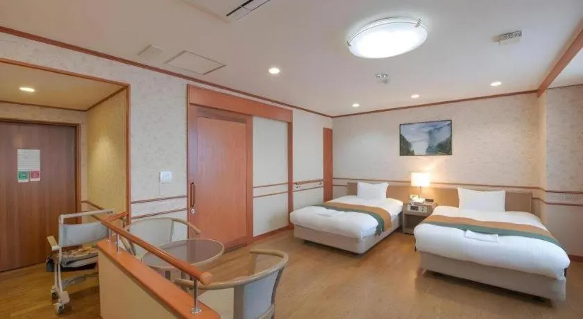 Bed in Hotel New Palace Aizuwakamatsu