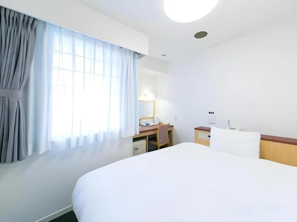 Bed in Pearl Hotel Kawasaki