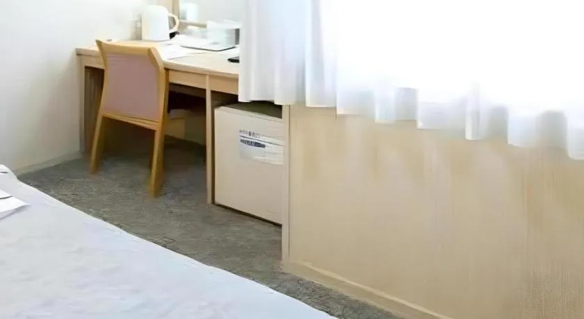 Bed in Pearl Hotel Kawasaki