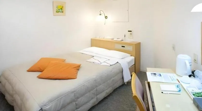 Bed in Pearl Hotel Kawasaki