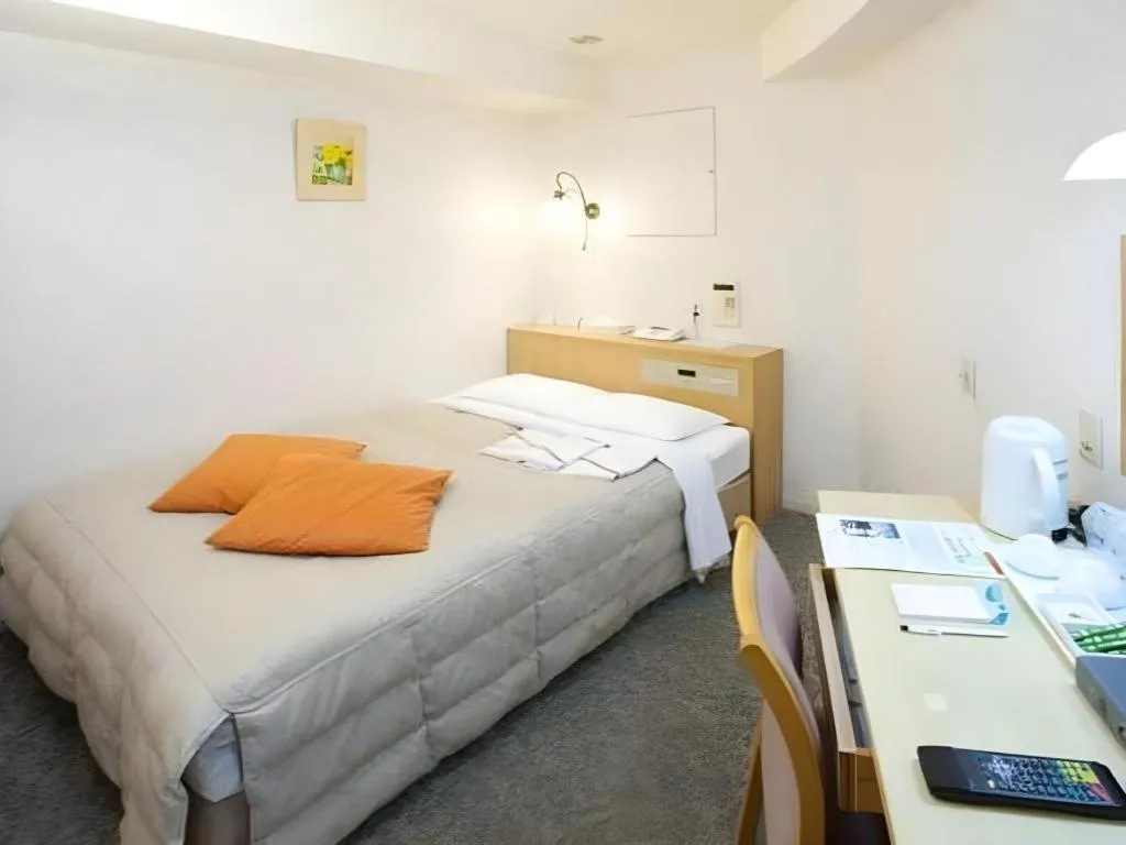 Bed in Pearl Hotel Kawasaki