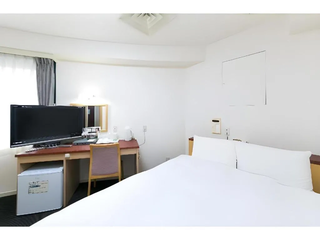 Bed in Pearl Hotel Kawasaki