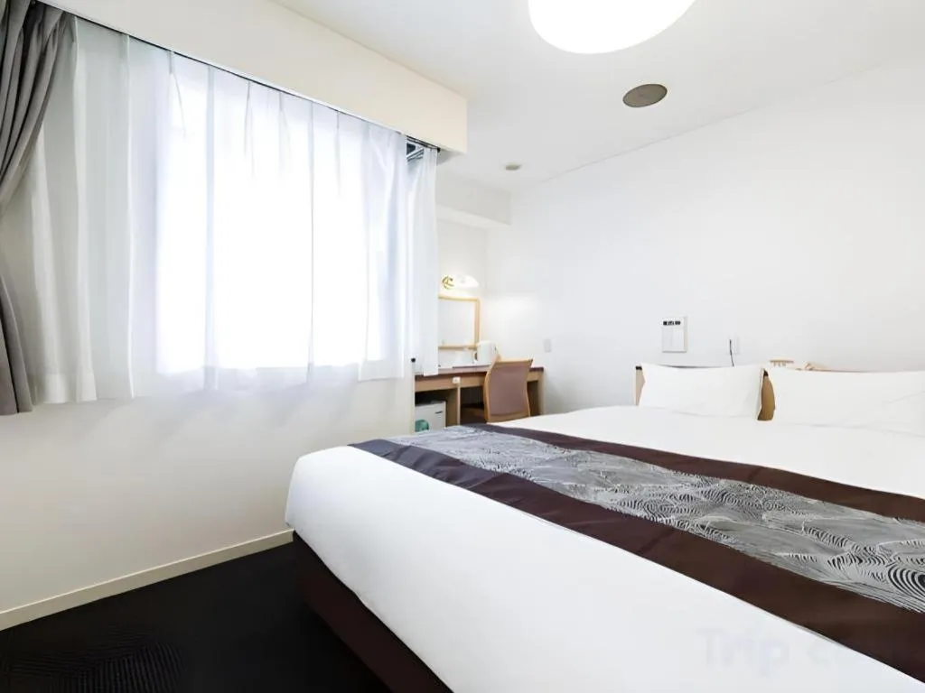 Bed in Pearl Hotel Kawasaki