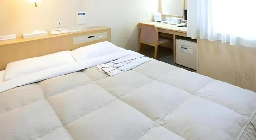 Bed in Pearl Hotel Kawasaki