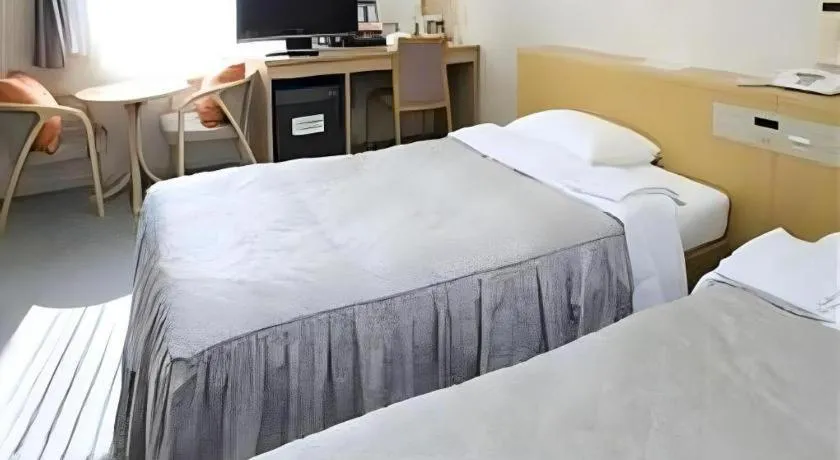 Bed in Pearl Hotel Kawasaki