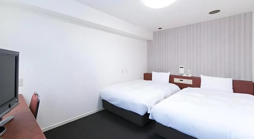 Bed in Pearl Hotel Kawasaki